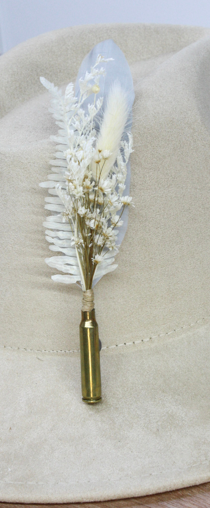 Bullet BrimBud hat pin Ivory with white feather, white fern, and cream florals on a cream felt hat